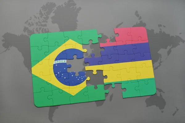 Rompecabezas con la bandera nacional de Brasil y Mauricio en un mapa del mundo fondo . —  Fotos de Stock