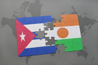 bir dünya haritası arka plan üzerinde küba ve nijer ulusal bayrağı ile bulmaca.