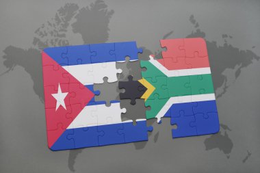 bir dünya haritası arka plan üzerinde Küba ve Güney Afrika ulusal bayrağı ile bulmaca.