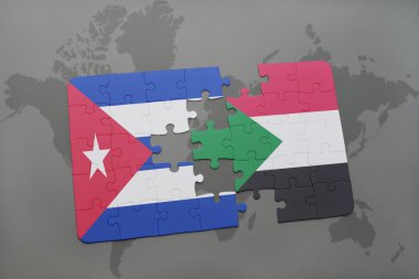 bir dünya haritası arka plan üzerinde küba ve sudan ulusal bayrağı ile bulmaca.