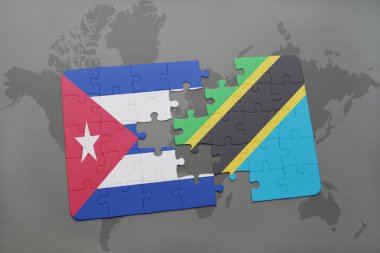 bir dünya haritası arka plan üzerinde Küba ve Tanzanya ulusal bayrağı ile bulmaca.