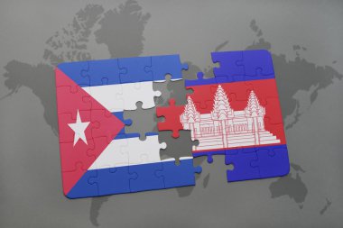 bir dünya haritası arka plan üzerinde küba ve kamboçya ulusal bayrağı ile bulmaca.