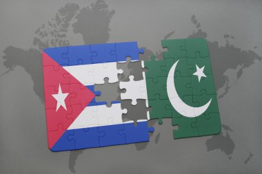 bir dünya haritası arka plan üzerinde Küba ve Pakistan ulusal bayrağı ile bulmaca.