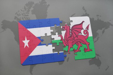 bir dünya haritası arka plan üzerinde küba ve walesulusal bayrağı ile bulmaca.