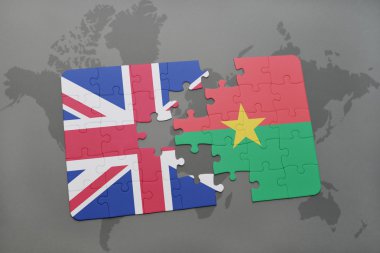 bir dünya haritası arka plan üzerinde büyük Britanya ve burkina faso ulusal bayrağı ile bulmaca.