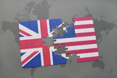 bir dünya haritası arka plan üzerinde büyük Britanya ve liberya ulusal bayrağı ile bulmaca.