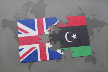 bir dünya haritası arka plan üzerinde büyük Britanya ve Libya ulusal bayrağı ile bulmaca.
