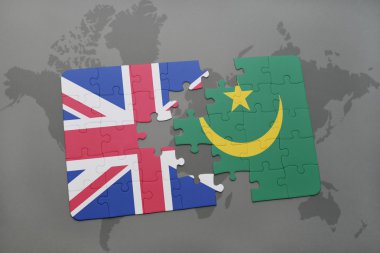 bir dünya haritası arka plan üzerinde büyük Britanya ve Moritanya ulusal bayrağı ile bulmaca.