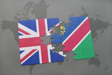 bir dünya haritası arka plan üzerinde büyük Britanya ve namibya ulusal bayrağı ile bulmaca.