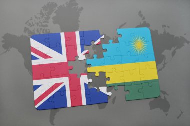 bir dünya haritası arka plan üzerinde büyük Britanya ve Ruanda ulusal bayrağı ile bulmaca.