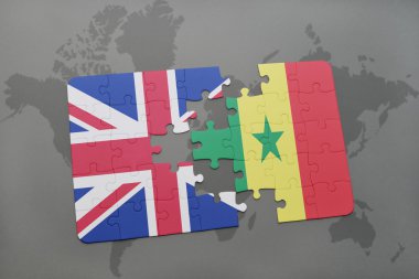 bir dünya haritası arka plan üzerinde büyük Britanya ve Senegal ulusal bayrağı ile bulmaca.