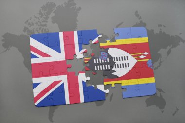 bir dünya haritası arka plan üzerinde büyük Britanya ve svaziland ulusal bayrağı ile bulmaca.