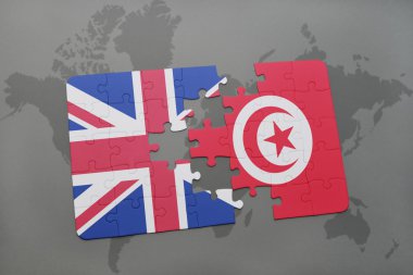 bir dünya haritası arka plan üzerinde büyük Britanya ve Tunus ulusal bayrağı ile bulmaca.