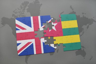 büyük Britanya'nın ulusal bayrağı ile bulmaca ve bir dünya haritası arka plan üzerinde togo.