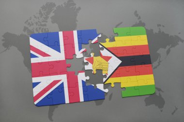 bir dünya haritası arka plan üzerinde büyük Britanya ve zimbabve ulusal bayrağı ile bulmaca.