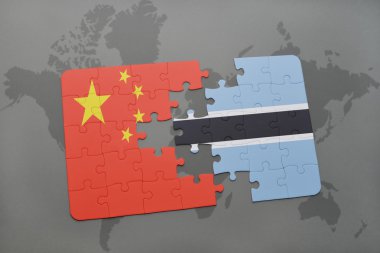 bir dünya haritası arka plan üzerinde çin ve botsvana ulusal bayrağı ile bulmaca.