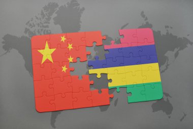 bir dünya haritası arka plan üzerinde çin ve mauritius ulusal bayrağı ile bulmaca.