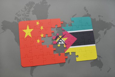 bir dünya haritası arka plan üzerinde Çin ve mozambik ulusal bayrağı ile bulmaca.