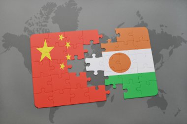 bir dünya haritası arka plan üzerinde çin ve nijer ulusal bayrağı ile bulmaca.