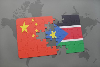 bir dünya haritası arka plan üzerinde Çin ve güney sudan ulusal bayrağı ile bulmaca.