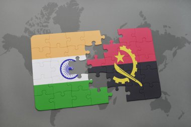 bir dünya haritası arka plan üzerinde Hindistan ve angola ulusal bayrağı ile bulmaca.