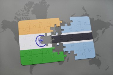 bir dünya haritası arka plan üzerinde hindistan ve botsvana ulusal bayrağı ile bulmaca.