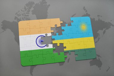 bir dünya haritası arka plan üzerinde Hindistan ve Ruanda ulusal bayrağı ile bulmaca.