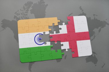 bir dünya haritası arka plan üzerinde Hindistan ve İngiltere ulusal bayrağı ile bulmaca.