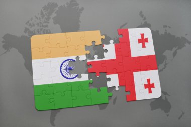 bir dünya haritası arka plan üzerinde Hindistan ve Gürcistan ulusal bayrağı ile bulmaca.