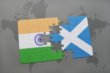 bir dünya haritası arka plan üzerinde Hindistan ve İskoçya ulusal bayrağı ile bulmaca.