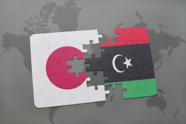bir dünya haritası arka plan üzerinde Japonya ve Libya ulusal bayrağı ile bulmaca.