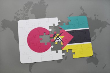 bir dünya haritası arka plan üzerinde Japonya ve mozambik ulusal bayrağı ile bulmaca.