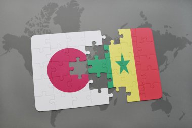 bir dünya haritası arka plan üzerinde Japonya ve Senegal ulusal bayrağı ile bulmaca.