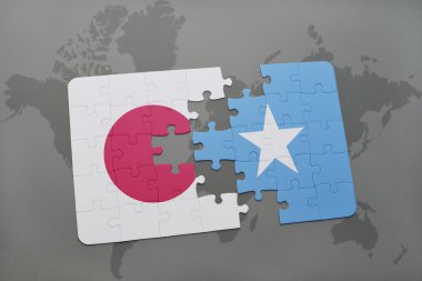 bir dünya haritası arka plan üzerinde Japonya ve Somali ulusal bayrağı ile bulmaca.