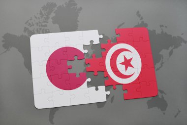 bir dünya haritası arka plan üzerinde Japonya ve Tunus ulusal bayrağı ile bulmaca.
