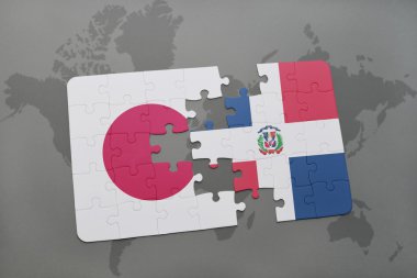 bir dünya haritası arka plan üzerinde Japonya ve Dominik Cumhuriyeti ulusal bayrağı ile bulmaca.
