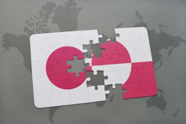 bir dünya haritası arka plan üzerinde Japonya ve grönland ulusal bayrağı ile bulmaca.