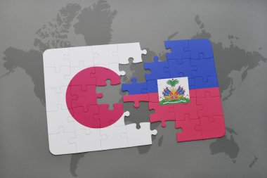 bir dünya haritası arka plan üzerinde Japonya ve Haiti ulusal bayrağı ile bulmaca.