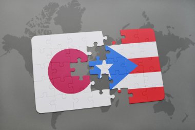 bir dünya haritası arka plan üzerinde Japonya ve Porto Riko ulusal bayrağı ile bulmaca.