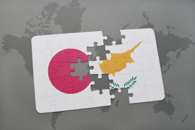 bir dünya haritası arka plan üzerinde Japonya ve Kıbrıs ulusal bayrağı ile bulmaca.