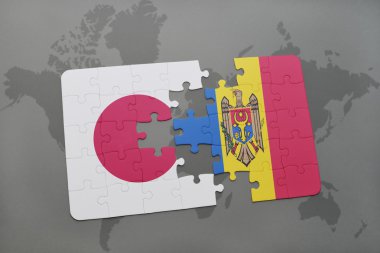 bir dünya haritası arka plan üzerinde Japonya ve Moldova ulusal bayrağı ile bulmaca.