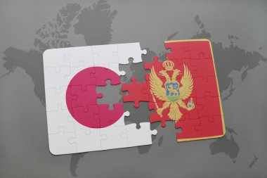 bir dünya haritası arka plan üzerinde Japonya ve Karadağ ulusal bayrağı ile bulmaca.