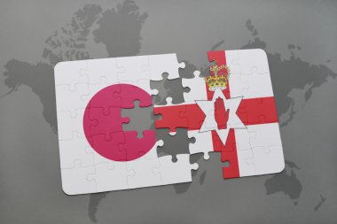 bir dünya haritası arka plan üzerinde Japonya ve Kuzey İrlanda ulusal bayrağı ile bulmaca.