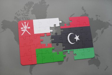 bir dünya haritası arka plan üzerinde umman ve libya ulusal bayrağı ile bulmaca.