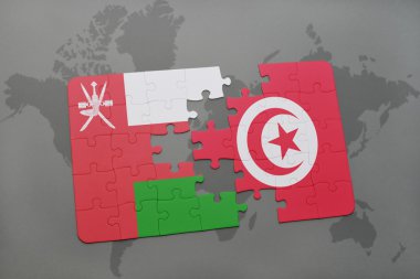 umman ve tunus ulusal bayrağı ile bulmaca bir dünya haritası arka plan.