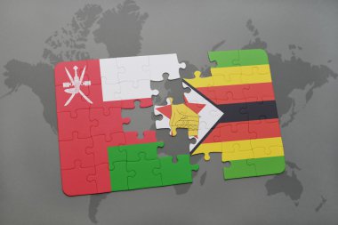 umman ve zimbabve ulusal bayrağı ile bulmaca bir dünya haritası arka plan üzerinde.