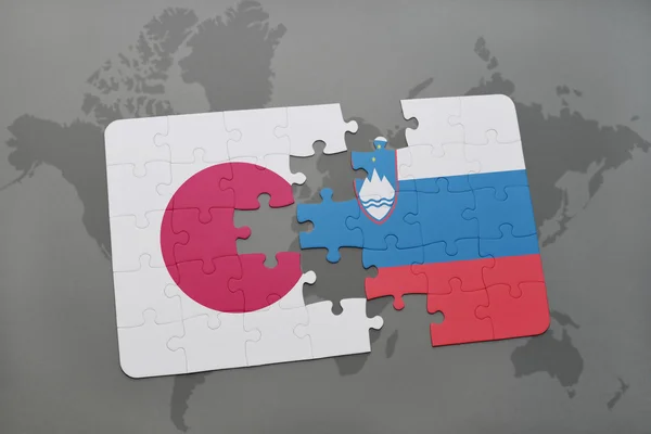 विश्व मानचित्र पृष्ठभूमि पर जापान और स्लोवेनिया के राष्ट्रीय ध्वज के साथ पहेली . — स्टॉक फ़ोटो, इमेज