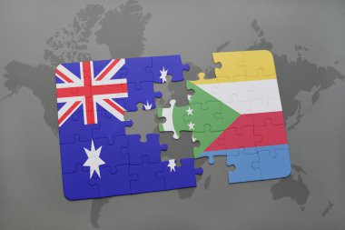 bir dünya haritası arka plan üzerinde Avustralya ve komor ulusal bayrağı ile bulmaca.