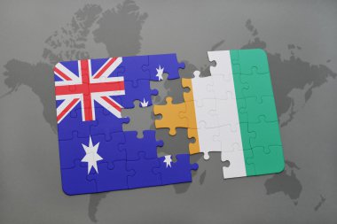 bir dünya haritası arka plan üzerinde Avustralya ve cote divoire ulusal bayrağı ile bulmaca.