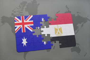 bir dünya haritası arka plan üzerinde Avustralya ve Mısır ulusal bayrağı ile bulmaca.